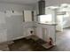 Open kitchen features a breakfast bar, modern vent hood, and plenty of natural light at 1539 Beecher Sw St, Atlanta, GA 30310