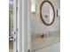 Modern bathroom with decorative tile, a vanity with plenty of counterspace and an attractive mirror at 215 Piedmont Ne Ave # 1406, Atlanta, GA 30308