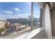 Expansive city view seen from a large window with a marble window sill at 215 Piedmont Ne Ave # 1406, Atlanta, GA 30308
