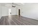 Large bedroom with ceiling fan, two large windows, and ensuite bathroom at 7434 Absinth Dr, Atlanta, GA 30349
