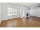 Bright living room featuring mixed flooring and a fireplace at 7434 Absinth Dr, Atlanta, GA 30349