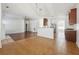 Open living space with a kitchen bar and stainless steel appliances at 7434 Absinth Dr, Atlanta, GA 30349