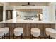 Kitchen island with seating and modern countertops, stainless steel appliances and decor on countertops at 1045 Shepherds Ne Ln, Atlanta, GA 30324