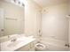 Well-lit bathroom with a tub/shower combo and single sink vanity at 2426 Fairlie Dr, Duluth, GA 30096