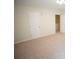 Spacious carpeted bedroom with a closet and a neutral color palette at 2426 Fairlie Dr, Duluth, GA 30096