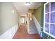 Welcoming foyer with hardwood floors, stairs, and view of the living room at 2426 Fairlie Dr, Duluth, GA 30096
