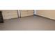 Clean, spacious garage with gray epoxy flooring and two-car capacity, offering ample parking at 2426 Fairlie Dr, Duluth, GA 30096