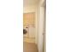 Convenient laundry room featuring a washer, dryer, and shelving for organized storage and functionality at 2426 Fairlie Dr, Duluth, GA 30096
