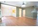 Open living area with hardwood floors and view of the dining area and kitchen at 2426 Fairlie Dr, Duluth, GA 30096