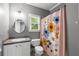 Cozy bathroom featuring peach shower curtain and sink at 1912 Hosea L Williams Ne Dr # 1, Atlanta, GA 30317