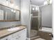 Well-lit bathroom with bathtub and shower at 1912 Hosea L Williams Ne Dr # 1, Atlanta, GA 30317
