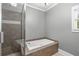 Bathroom includes standalone shower and bathtub at 1912 Hosea L Williams Ne Dr # 1, Atlanta, GA 30317