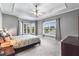 Spacious primary bedroom with large windows and a trey ceiling with ceiling fan at 1912 Hosea L Williams Ne Dr # 1, Atlanta, GA 30317