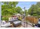 Deck features outdoor seating and mature trees at 1912 Hosea L Williams Ne Dr # 1, Atlanta, GA 30317
