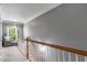 Upstairs hallway with natural light, staircase, and neutral decor at 1912 Hosea L Williams Ne Dr # 1, Atlanta, GA 30317