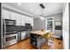 Modern kitchen featuring an island, stainless steel appliances, and stylish finishes at 1912 Hosea L Williams Ne Dr # 1, Atlanta, GA 30317