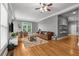 Spacious living room with hardwood floors, large windows, and a comfortable, classic sofa at 1912 Hosea L Williams Ne Dr # 1, Atlanta, GA 30317