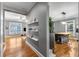 Open-concept living room flowing into kitchen with hardwood floors and plenty of natural light at 1912 Hosea L Williams Ne Dr # 1, Atlanta, GA 30317