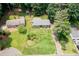 Aerial view of the property showcasing the home, large lot, and mature trees at 272 Creek Sw Ct, Marietta, GA 30064