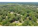 Aerial view of the property surrounded by lush greenery, in a serene location at 272 Creek Sw Ct, Marietta, GA 30064