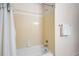 Bright bathroom with bathtub and shower with tile surround at 272 Creek Sw Ct, Marietta, GA 30064