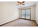 Comfortable bedroom with carpet flooring and a ceiling fan at 272 Creek Sw Ct, Marietta, GA 30064