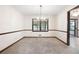 Classic dining room with elegant chandelier and neutral walls at 272 Creek Sw Ct, Marietta, GA 30064