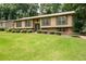 Inviting home with manicured landscaping and a well-maintained lawn at 272 Creek Sw Ct, Marietta, GA 30064