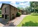 Spacious home with brick exterior, attached garage, and manicured lawn, great curb appeal at 272 Creek Sw Ct, Marietta, GA 30064
