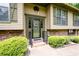 Close up of the front entrance, showcasing the front door, brickwork and well maintained landscaping at 272 Creek Sw Ct, Marietta, GA 30064