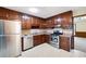 Well-equipped kitchen featuring stainless steel appliances and sleek countertops at 272 Creek Sw Ct, Marietta, GA 30064