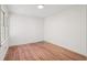 Inviting bedroom features natural light from the windows, hardwood floors, and neutral walls at 3422 Maplehurst Dr, Decatur, GA 30032
