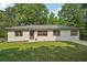 Attractive home with well-kept lawn and landscaping at 3422 Maplehurst Dr, Decatur, GA 30032