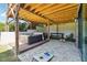 Backyard patio with a hot tub, string lights and space for outdoor games at 3842 Ernest W Barrett Sw Pkwy, Marietta, GA 30064