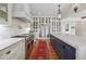 Chef's kitchen with marble countertops, stainless steel appliances, and hardwood floors at 3842 Ernest W Barrett Sw Pkwy, Marietta, GA 30064