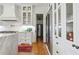 Charming kitchen features white cabinets, marble countertops, and stainless steel appliances at 3842 Ernest W Barrett Sw Pkwy, Marietta, GA 30064