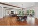 Open-concept living room features hardwood floors, beamed ceilings and backyard access at 3842 Ernest W Barrett Sw Pkwy, Marietta, GA 30064