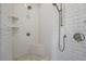 Modern shower with white subway tile, dual shower heads, and a corner seat at 3842 Ernest W Barrett Sw Pkwy, Marietta, GA 30064