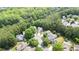 Drone shot of the community nestled among trees in a quiet neighborhood at 428 Redwood Trl, Canton, GA 30114
