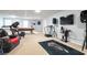 Finished basement offering a pool table, exercise equipment, and media setup at 428 Redwood Trl, Canton, GA 30114