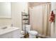 Cozy bathroom with a shower, toilet, and vanity with storage at 428 Redwood Trl, Canton, GA 30114