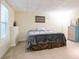Cozy bedroom with neutral color palette, soft carpet, and a comfortable bed setup at 428 Redwood Trl, Canton, GA 30114