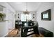 The dining area has an ornate chandelier and wooden floors at 428 Redwood Trl, Canton, GA 30114