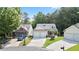 Charming home exterior featuring a well-manicured lawn and inviting curb appeal at 428 Redwood Trl, Canton, GA 30114