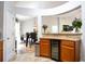 An open concept eat-in kitchen has recessed lighting and a wine cooler at 428 Redwood Trl, Canton, GA 30114