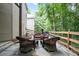 Outdoor patio featuring a comfortable seating area perfect for relaxing in a natural setting at 428 Redwood Trl, Canton, GA 30114