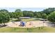 Community playground with a variety of play equipment and a covered picnic area at 428 Redwood Trl, Canton, GA 30114