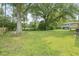 Expansive backyard with mature trees provides a private and serene outdoor space at 1261 Cliffwood Se Dr, Smyrna, GA 30080