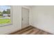 Bright living space with fresh paint, wood-look floors, and natural light at 1261 Cliffwood Se Dr, Smyrna, GA 30080