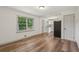 Open-concept with windows, a door, and view into the home's new kitchen at 1261 Cliffwood Se Dr, Smyrna, GA 30080